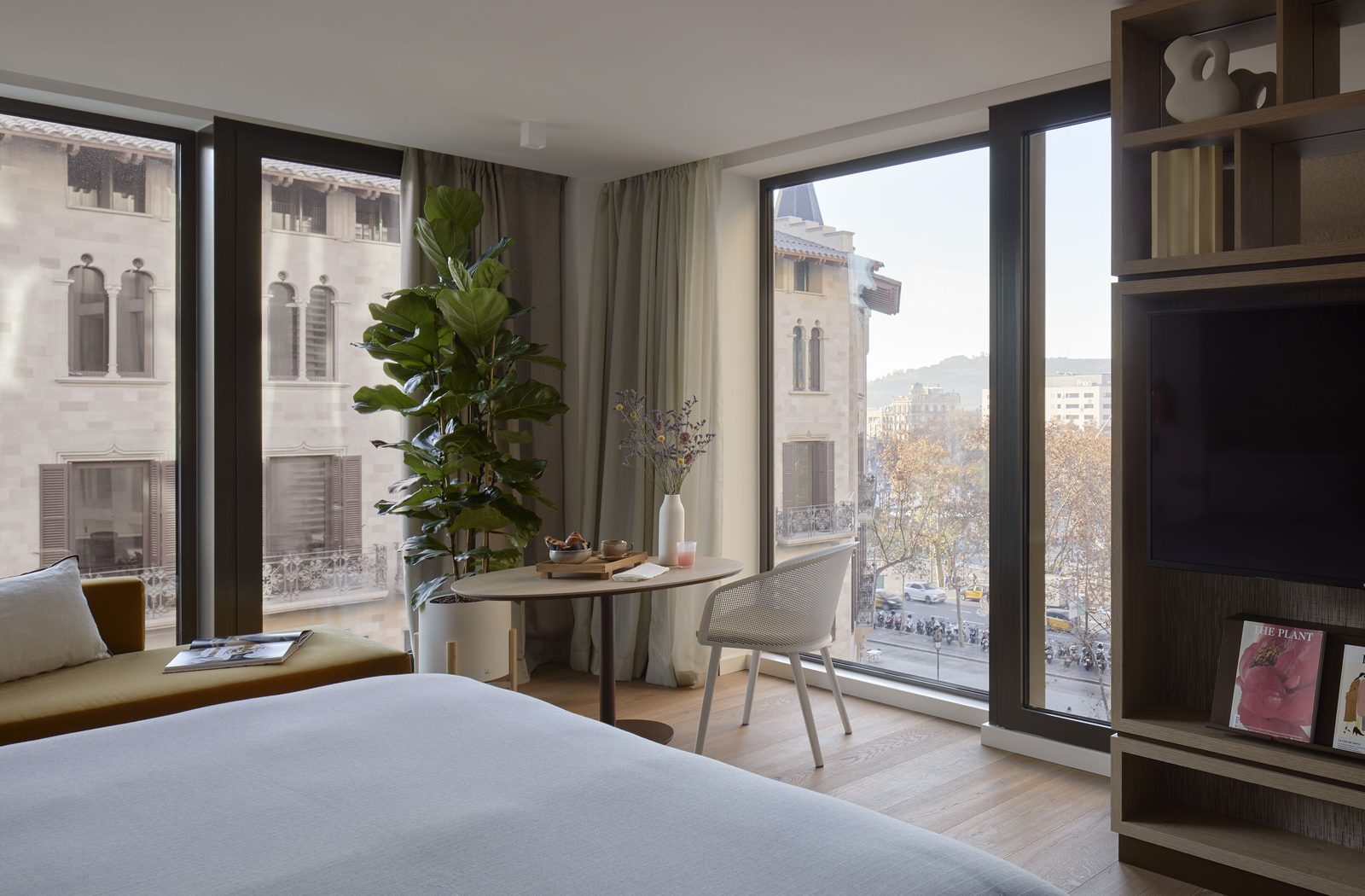 Stylish room with bed against window wall